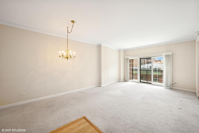 44 N Vail Ave Unit 313, Arlington Heights, IL 60005 - carpeted empty room featuring ornamental molding, a chandelier, and baseboards