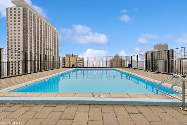 community pool with fence
