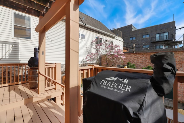 deck featuring a grill