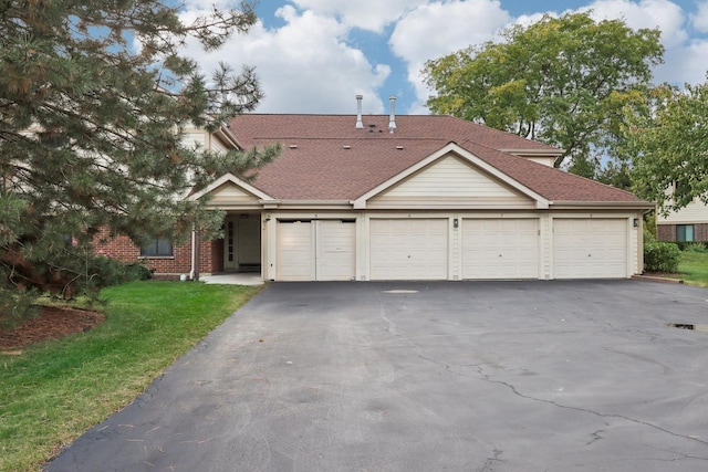 810 E Kings Row Unit 6, Palatine, IL 60074 - view of front of home featuring roof with shingles, aphalt driveway, a front lawn, and brick siding
