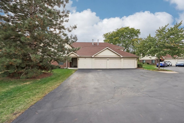 810 E Kings Row Unit 6, Palatine, IL 60074 - view of front facade with an attached garage, a front lawn, and aphalt driveway