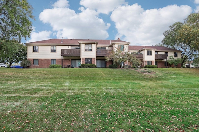 810 E Kings Row Unit 6, Palatine, IL 60074 - back of property with a lawn and brick siding