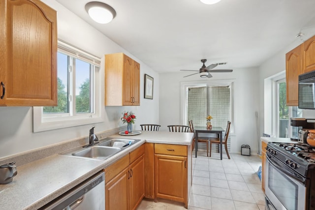 810 E Kings Row Unit 6, Palatine, IL 60074 - kitchen featuring light tile patterned flooring, appliances with stainless steel finishes, plenty of natural light, and a sink