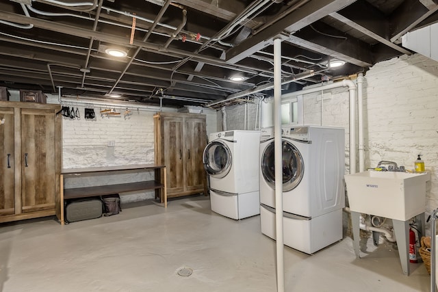 220 N Myrtle Ave, Elmhurst, IL 60126 - washroom featuring laundry area, washing machine and dryer, a sink, and brick wall