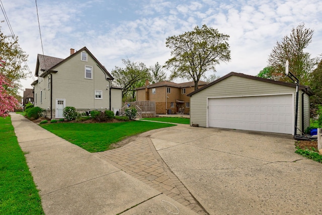 220 N Myrtle Ave, Elmhurst, IL 60126 - view of side of home with a garage, an outdoor structure, and a yard