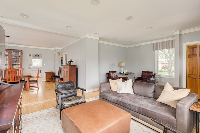 220 N Myrtle Ave, Elmhurst, IL 60126 - living area featuring crown molding, a wealth of natural light, and light wood-type flooring