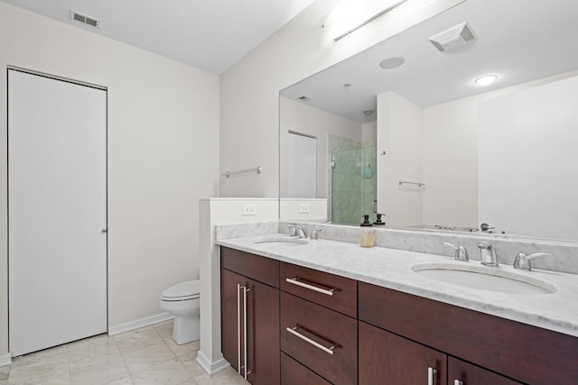 full bathroom featuring visible vents, a sink, marble finish floor, and a shower stall