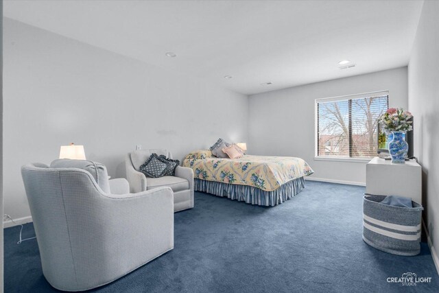 carpeted bedroom featuring baseboards and recessed lighting
