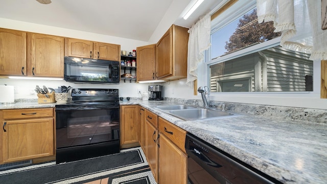 1008 Mary Ave, Dixon, IL 61021 - kitchen featuring black appliances, a sink, tile patterned floors, light countertops, and brown cabinetry