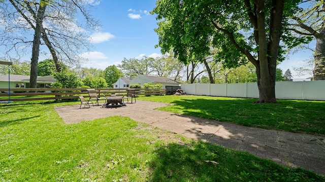 1008 Mary Ave, Dixon, IL 61021 - view of yard featuring a patio area and a fire pit