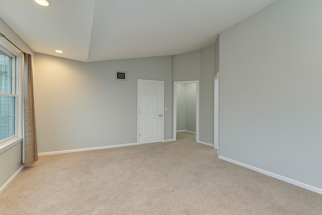 3615 Fairfax Ct E, Aurora, IL 60504 - unfurnished room featuring carpet flooring, recessed lighting, vaulted ceiling, baseboards, and healthy amount of natural light