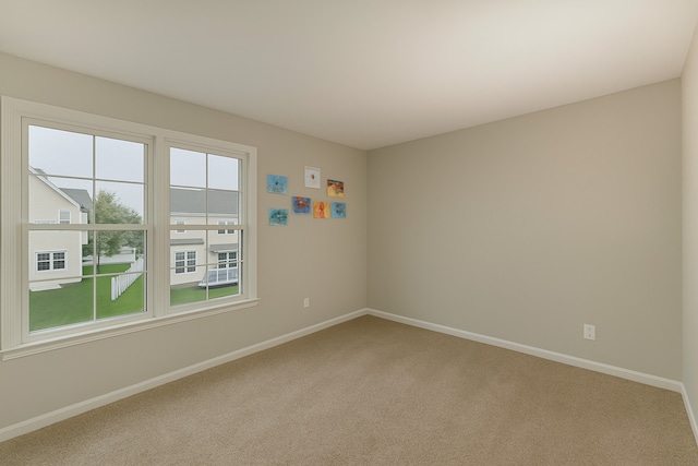 3615 Fairfax Ct E, Aurora, IL 60504 - spare room featuring light carpet and baseboards