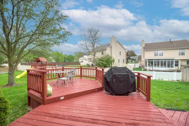 3615 Fairfax Ct E, Aurora, IL 60504 - deck with a grill and a playground