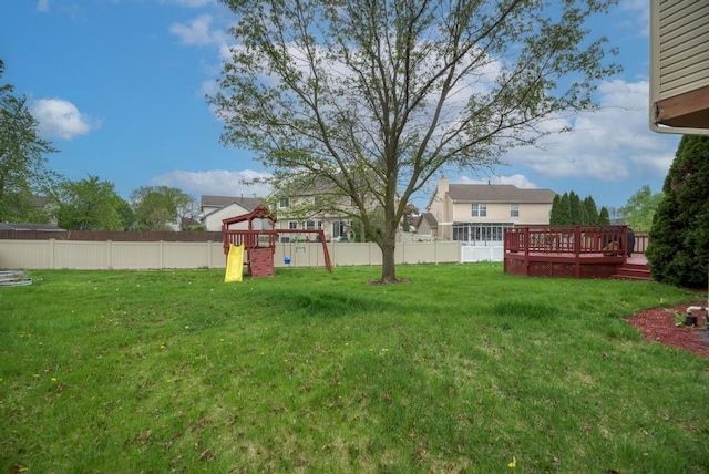 3615 Fairfax Ct E, Aurora, IL 60504 - view of yard featuring a playground and a wooden deck