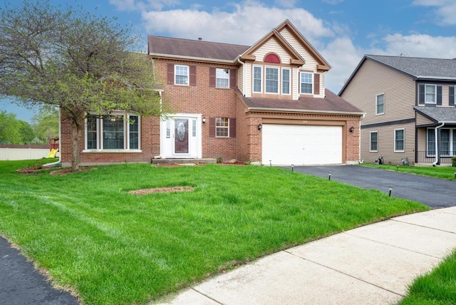 3615 Fairfax Ct E, Aurora, IL 60504 - view of front facade with driveway, brick siding, an attached garage, and a front lawn