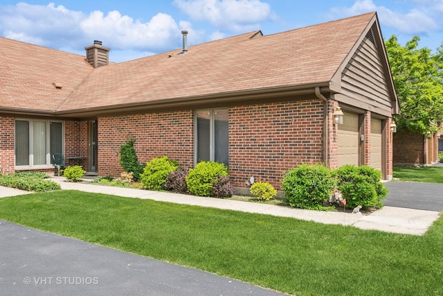736 Picardy Cir, Northbrook, IL 60062 - view of property exterior with brick siding, a yard, and a chimney