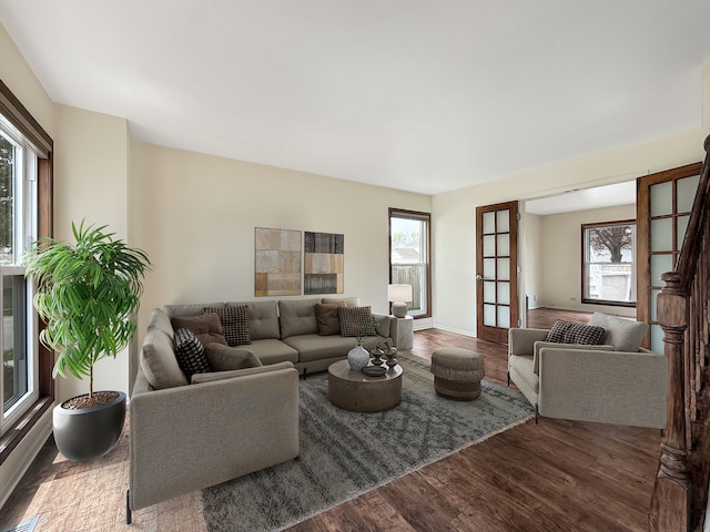 living area with dark wood-style flooring