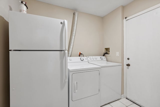 759 Dunmore Ln, Bartlett, IL 60103 - washroom featuring laundry area, separate washer and dryer, and light tile patterned floors