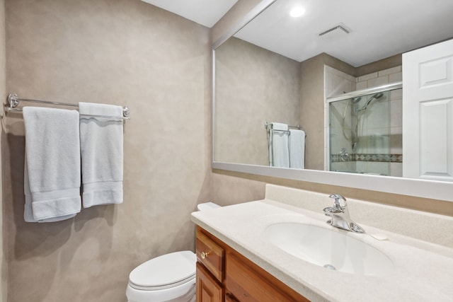 759 Dunmore Ln, Bartlett, IL 60103 - bathroom featuring a stall shower, toilet, vanity, and visible vents
