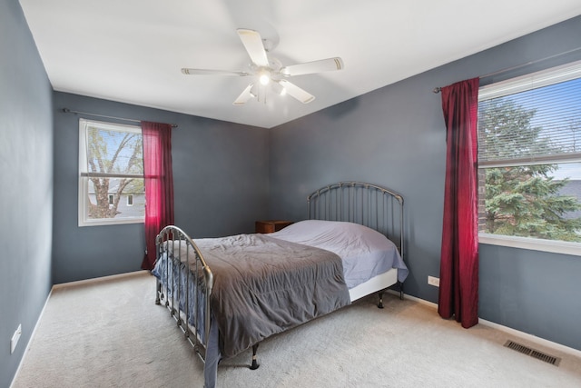 759 Dunmore Ln, Bartlett, IL 60103 - carpeted bedroom with a ceiling fan, baseboards, and visible vents