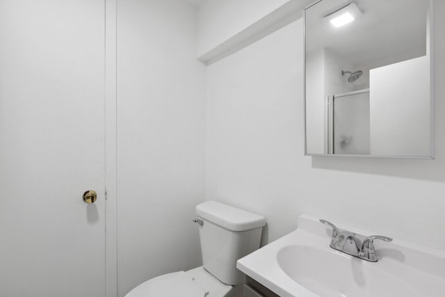 759 Dunmore Ln, Bartlett, IL 60103 - bathroom featuring toilet, a shower with door, and vanity