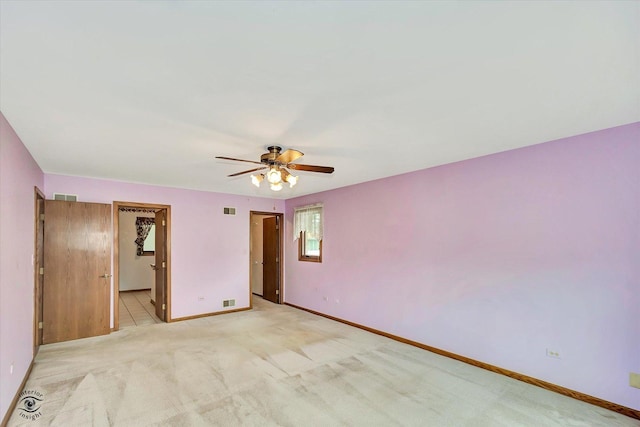 19640 Patricia Ln, Mokena, IL 60448 - empty room featuring a ceiling fan, baseboards, and light carpet