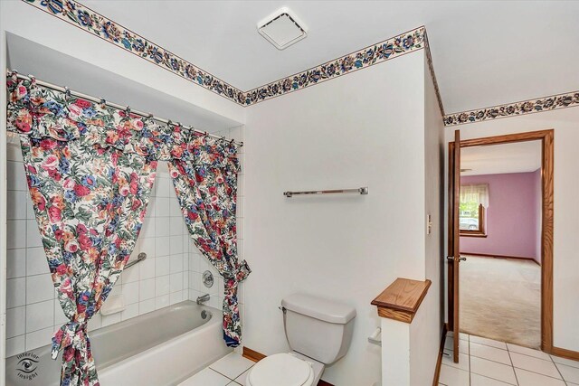 19640 Patricia Ln, Mokena, IL 60448 - bathroom featuring tile patterned flooring, toilet, baseboards, and shower / bath combination with curtain