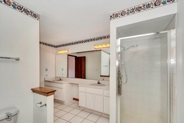 19640 Patricia Ln, Mokena, IL 60448 - full bath with a stall shower, tile patterned floors, vanity, and toilet