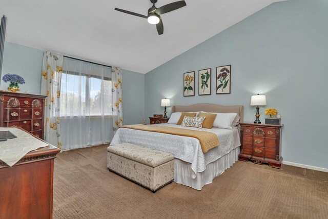 bedroom featuring carpet floors, a ceiling fan, and lofted ceiling