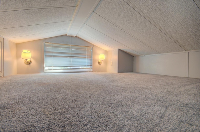 additional living space featuring carpet flooring