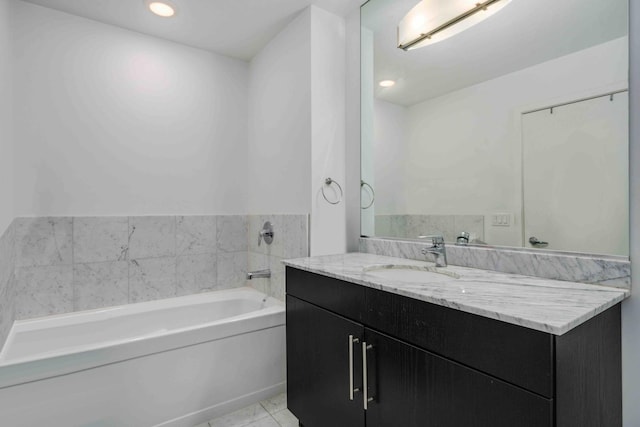 123 S Green St Unit 710B, Chicago, IL 60607 - bathroom with vanity, recessed lighting, and a bath