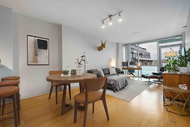 123 S Green St Unit 710B, Chicago, IL 60607 - dining room featuring light wood-type flooring
