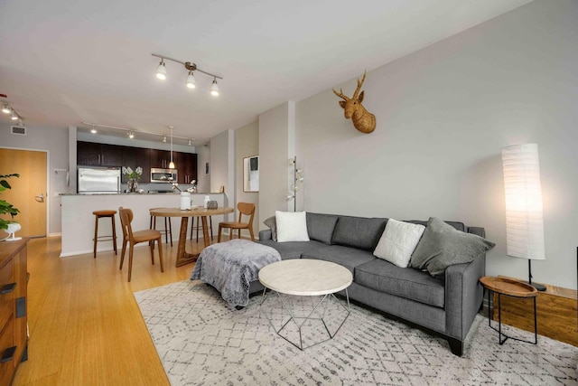 123 S Green St Unit 710B, Chicago, IL 60607 - living room with track lighting, light wood-type flooring, and visible vents