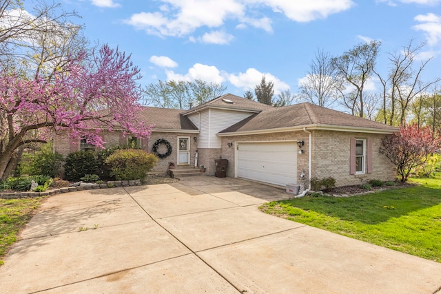 view of front of property with brick siding, a garage, a front lawn, concrete driveway, and a shingled roof