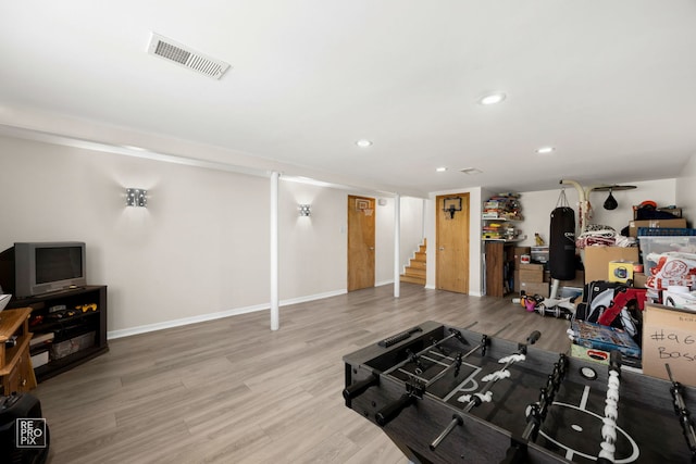 4704 W 99th St, Oak Lawn, IL 60453 - living room with wood finished floors, stairs, and recessed lighting
