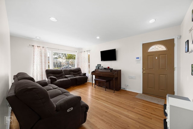 4704 W 99th St, Oak Lawn, IL 60453 - living area featuring light wood-style floors and recessed lighting