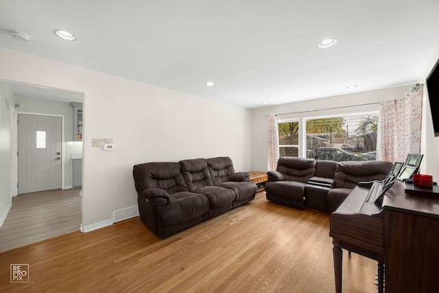 4704 W 99th St, Oak Lawn, IL 60453 - living room featuring light wood-style floors and recessed lighting