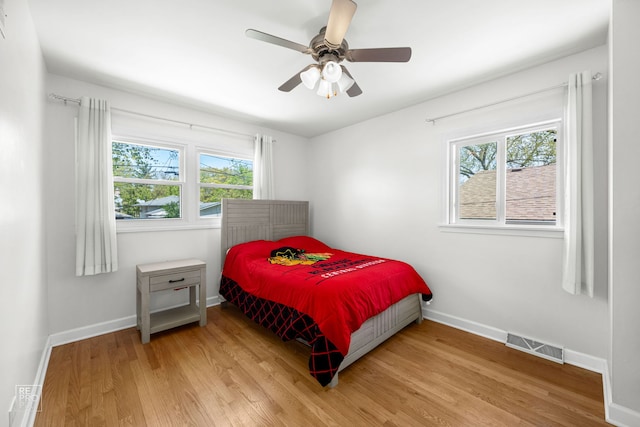 4704 W 99th St, Oak Lawn, IL 60453 - bedroom featuring wood finished floors and a ceiling fan