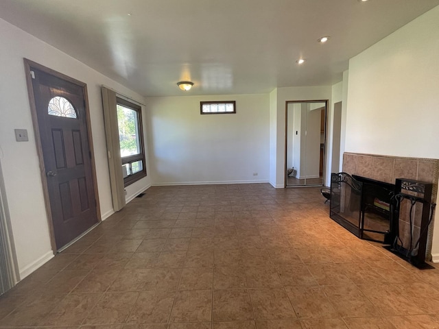 entryway featuring baseboards and recessed lighting