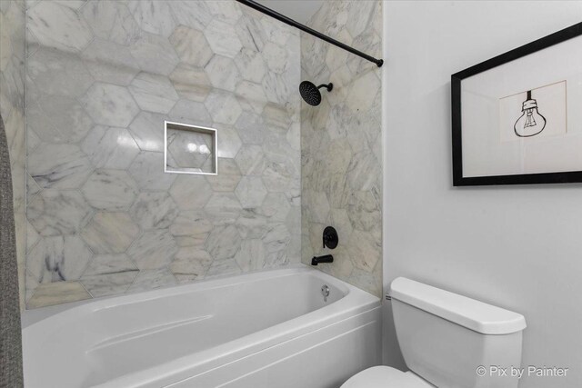 full bath featuring toilet and shower / bathing tub combination