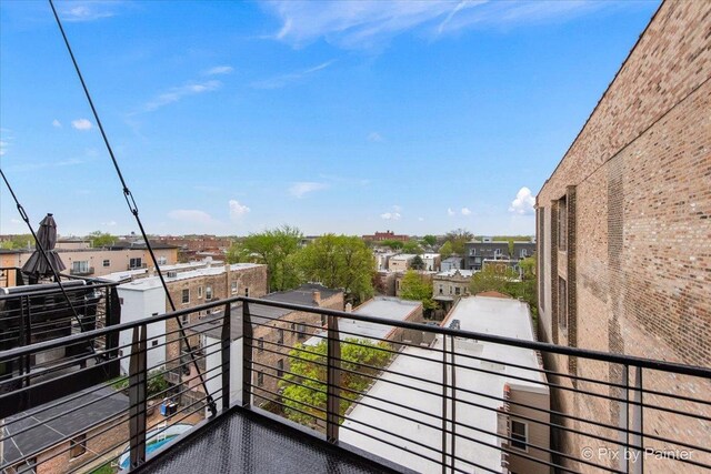 balcony featuring a residential view