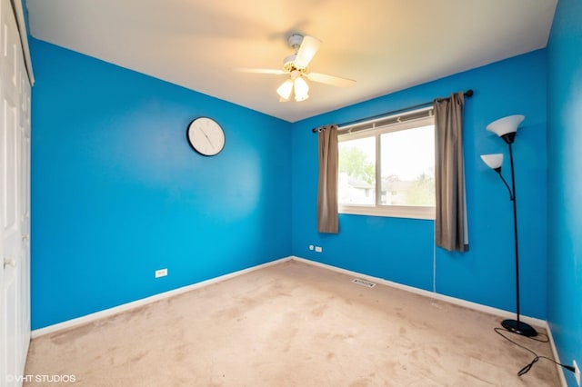 1141 E Randville Dr, Palatine, IL 60074 - unfurnished room featuring visible vents, baseboards, ceiling fan, and carpet floors