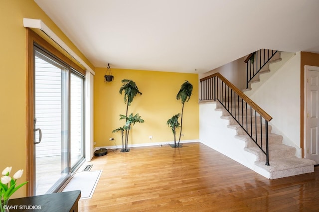 1141 E Randville Dr, Palatine, IL 60074 - interior space featuring baseboards, stairs, and wood finished floors