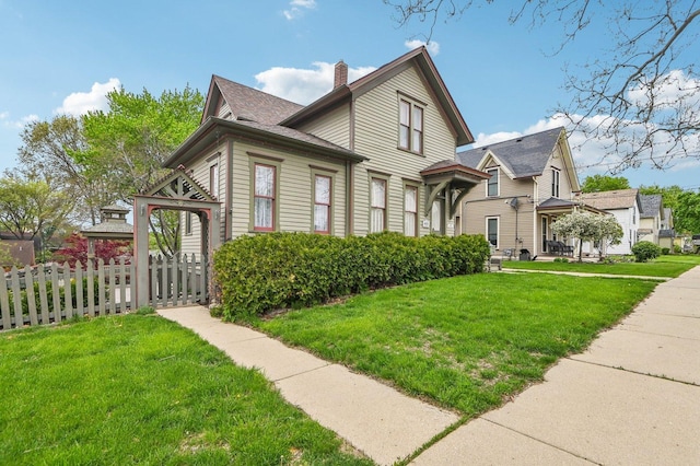 108 N Channing St, Elgin, IL 60120 - view of front of property with a chimney and a shingled roof