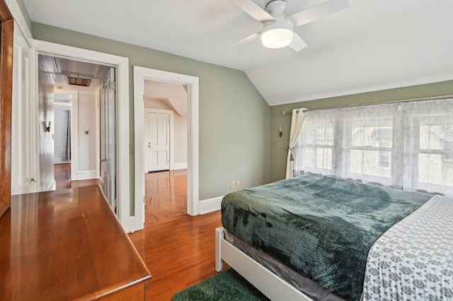108 N Channing St, Elgin, IL 60120 - bedroom with attic access, wood finished floors, lofted ceiling, a ceiling fan, and baseboards