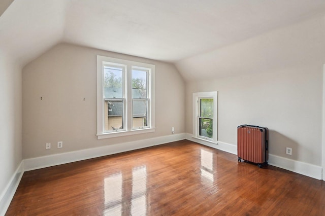 108 N Channing St, Elgin, IL 60120 - bonus room featuring radiator, lofted ceiling, wood finished floors, and baseboards