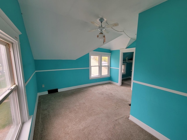 2811 Ezekiel Ave, Zion, IL 60099 - bonus room featuring baseboards, a ceiling fan, lofted ceiling, and carpet flooring