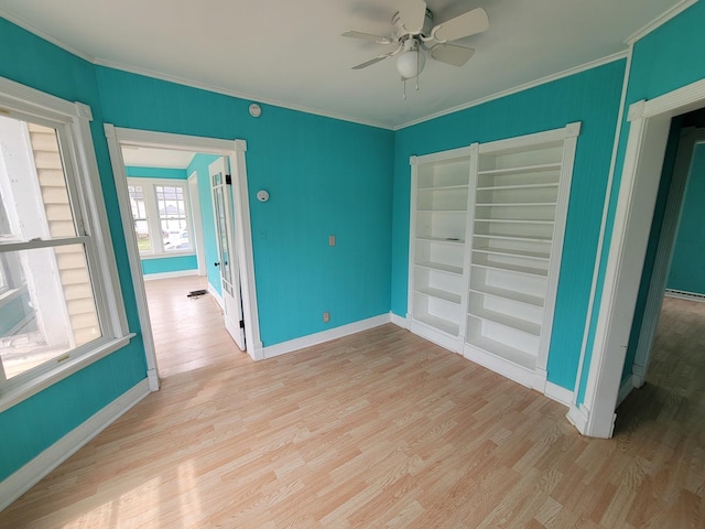 2811 Ezekiel Ave, Zion, IL 60099 - unfurnished bedroom with baseboards, ceiling fan, ornamental molding, and wood finished floors