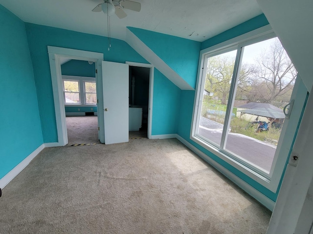 2811 Ezekiel Ave, Zion, IL 60099 - additional living space with baseboards, carpet flooring, ceiling fan, and lofted ceiling