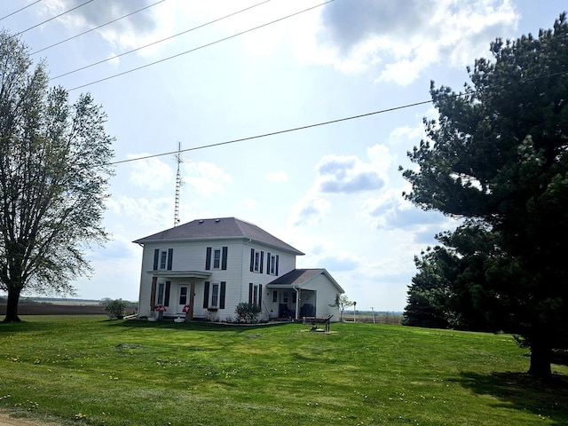 8554 S Daysville Rd, Franklin Grove, IL 61031 - view of front facade featuring a front lawn